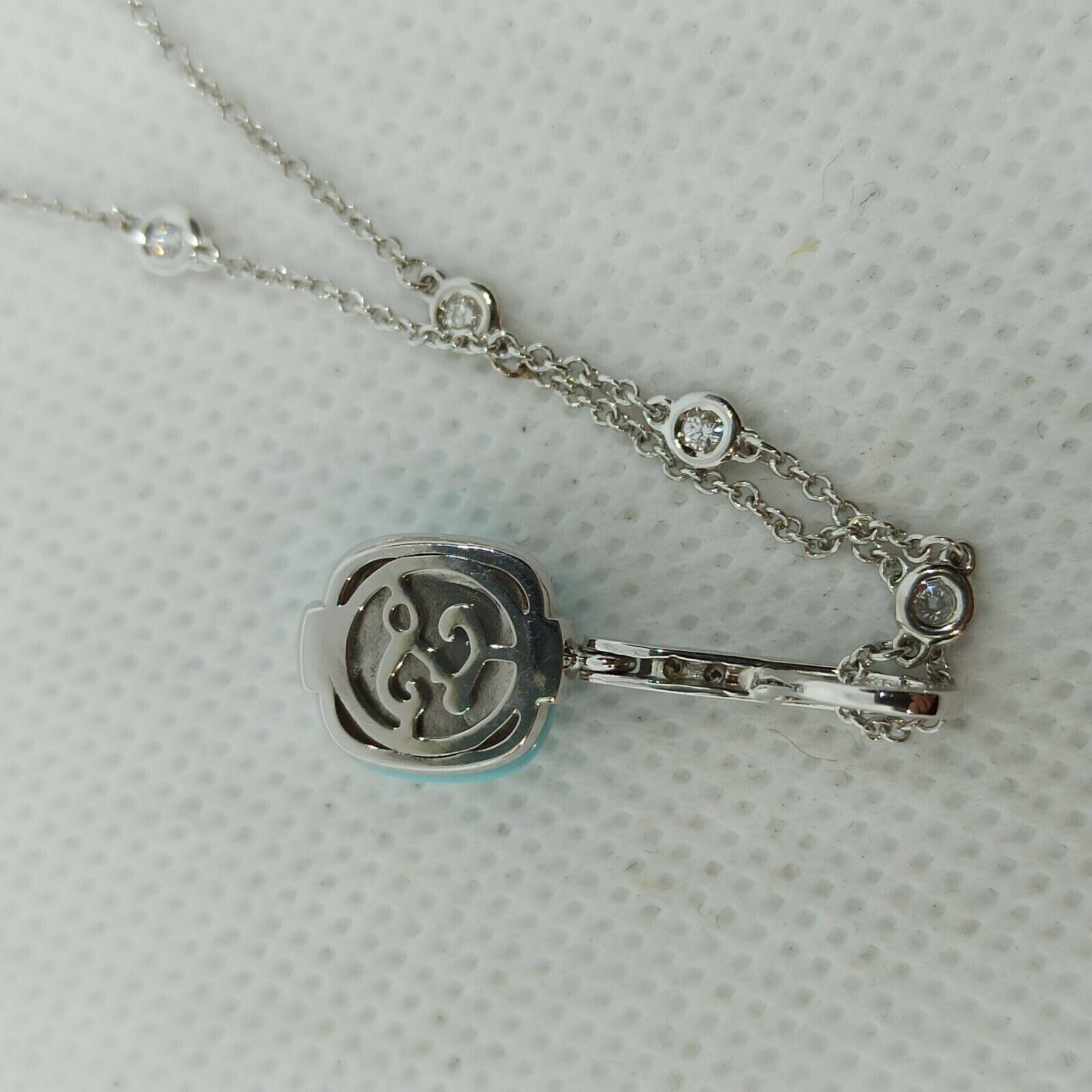 Collana punti luce oro bianco 18 kt pendente turchese diamanti marca Zoccai.