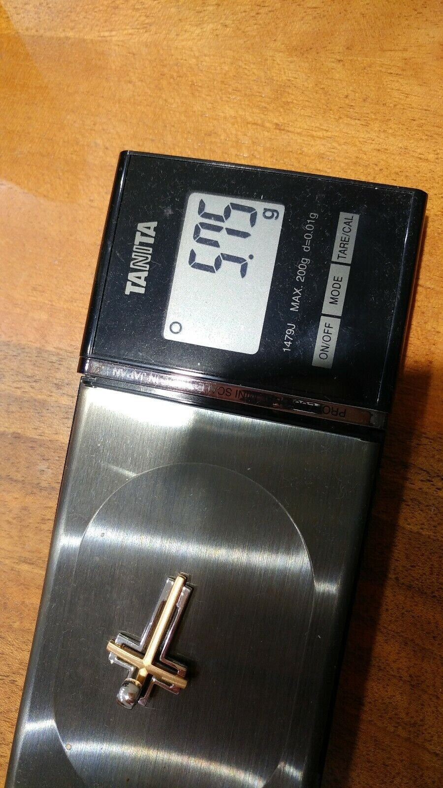 Croce da uomo in oro bianco e rosa  18 kt ( 750)  grammi 5,75.