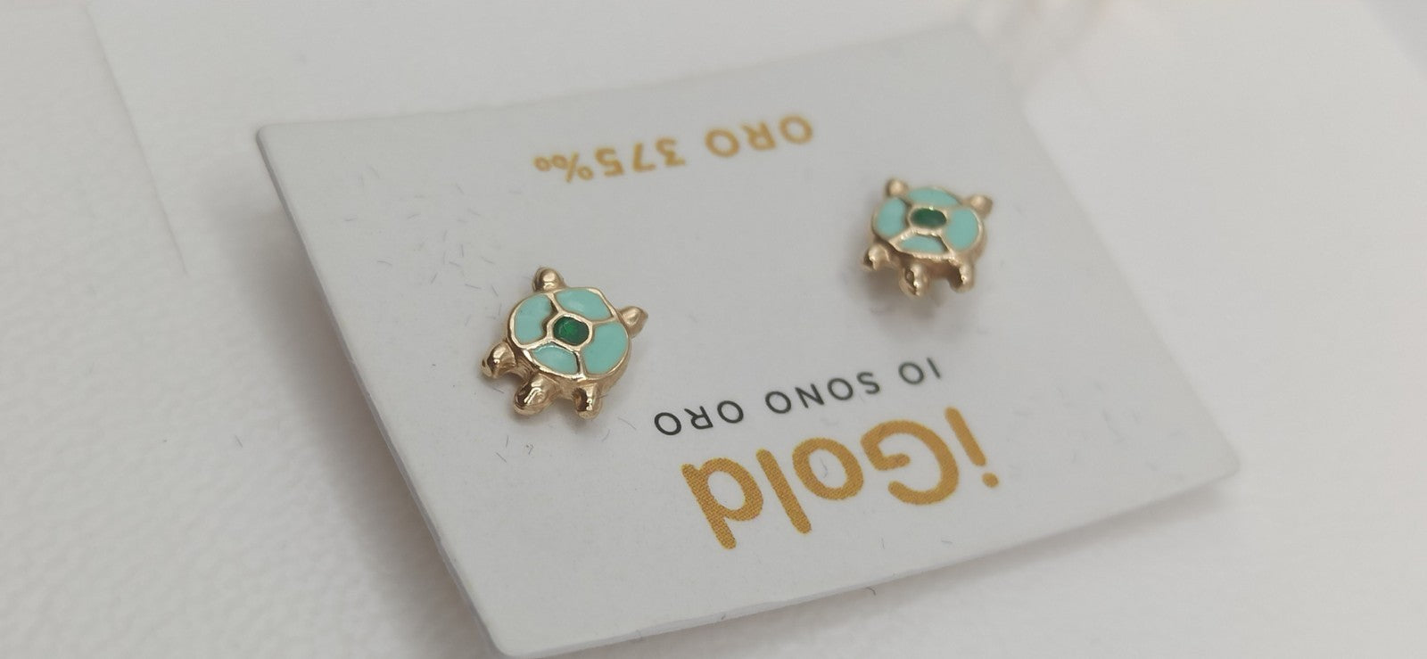 Orecchini in oro giallo 9 kt modello tartaruga con smalti. 