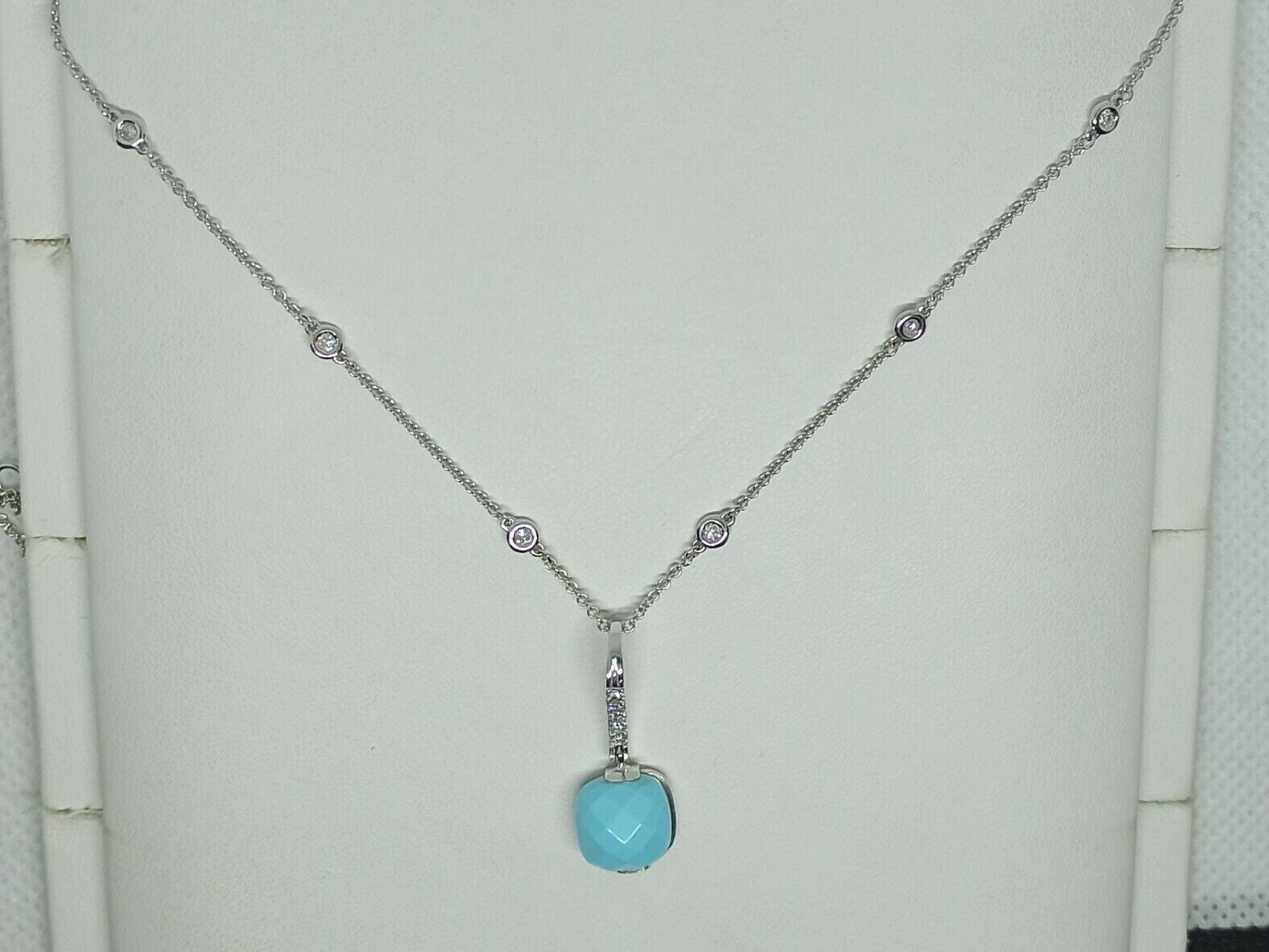 Collana punti luce oro bianco 18 kt pendente turchese diamanti marca Zoccai.