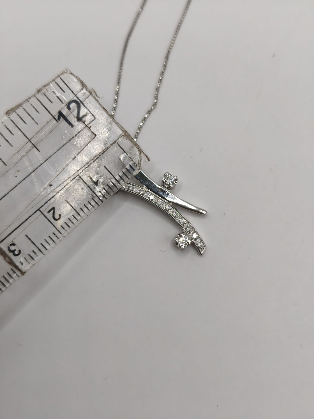 Collana Trilogy  oro bianco 18 Kt Impreziosita con altri 13 Diamanti più piccoli