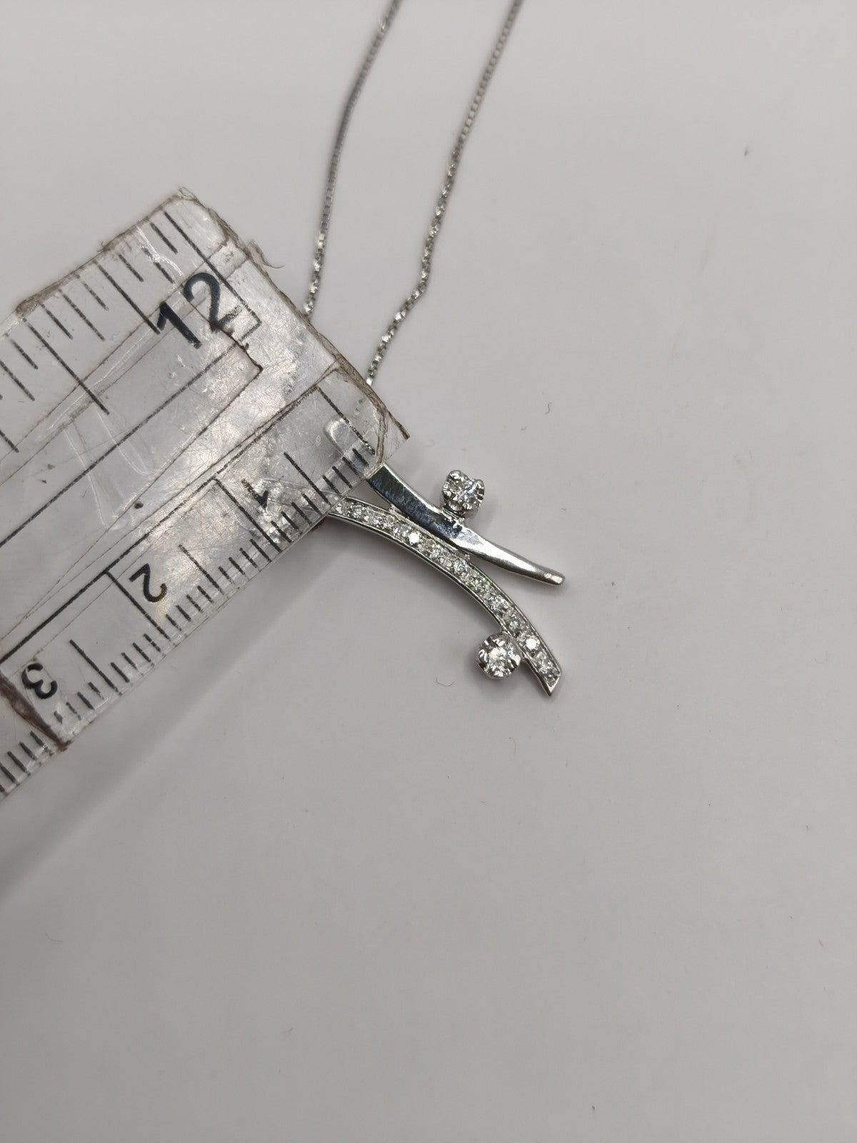 Collana Trilogy  oro bianco 18 Kt Impreziosita con altri 13 Diamanti più piccoli