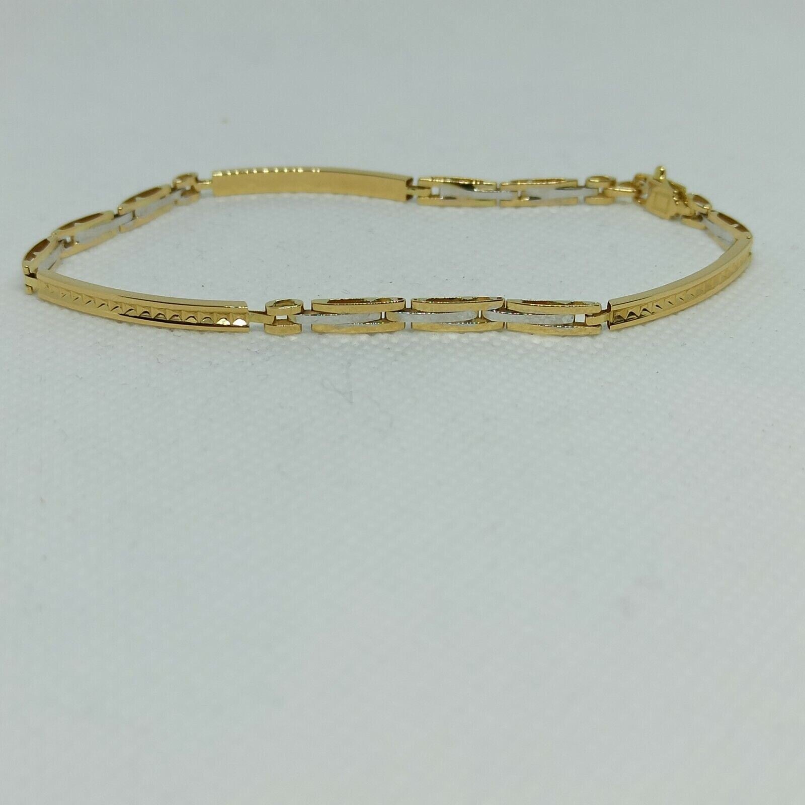 Bracciale a maglie da uomo in oro giallo e bianco 18 kt ( 750)  grammi 5,4. 