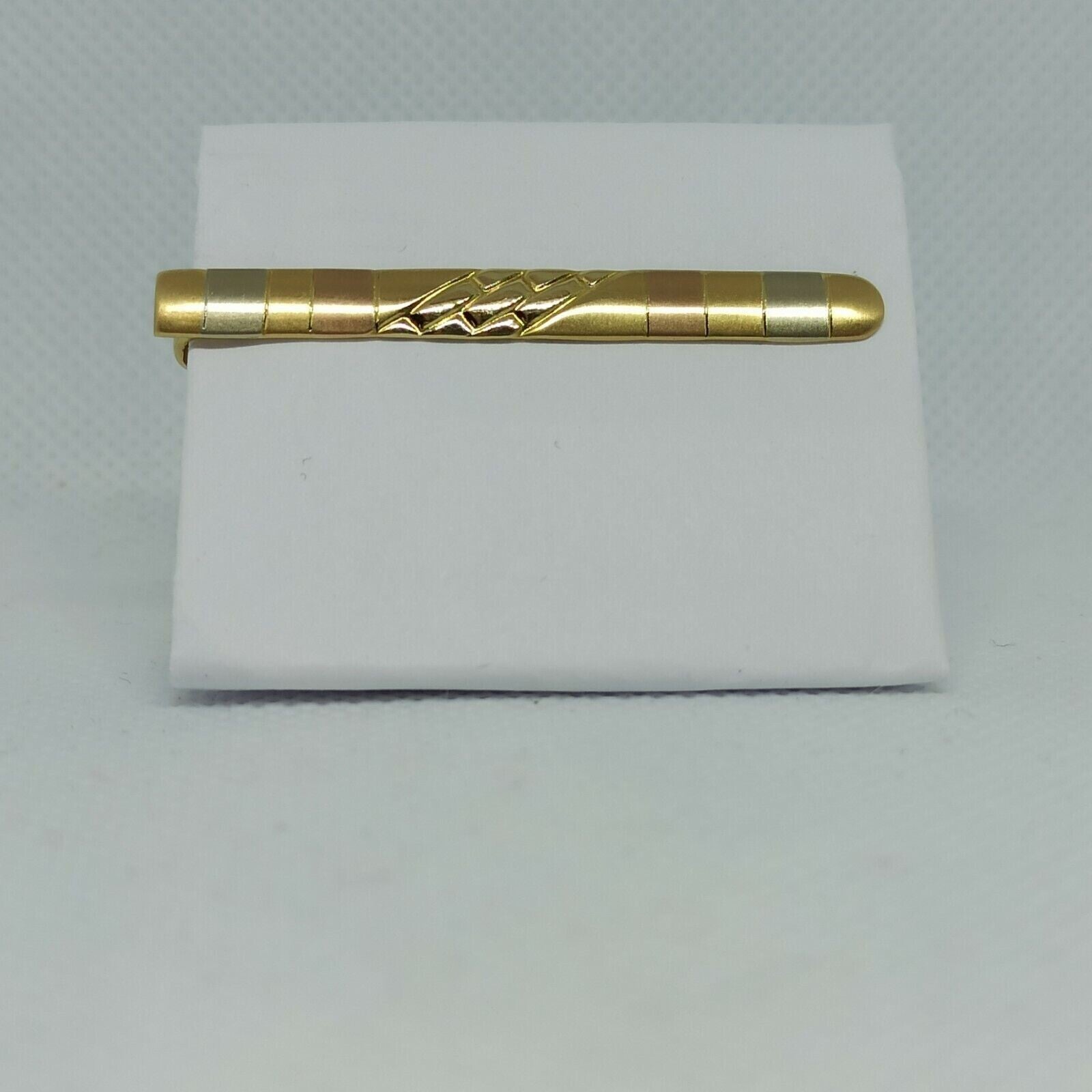 Fermacravatta in oro giallo rosa e  bianco satinato  18 kt