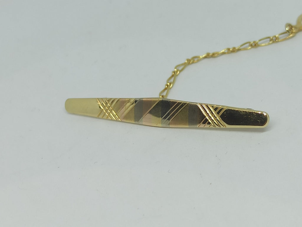 Fermacravatta usato in oro giallo rosa bianco satinato e lucido  18 kt grammi 5