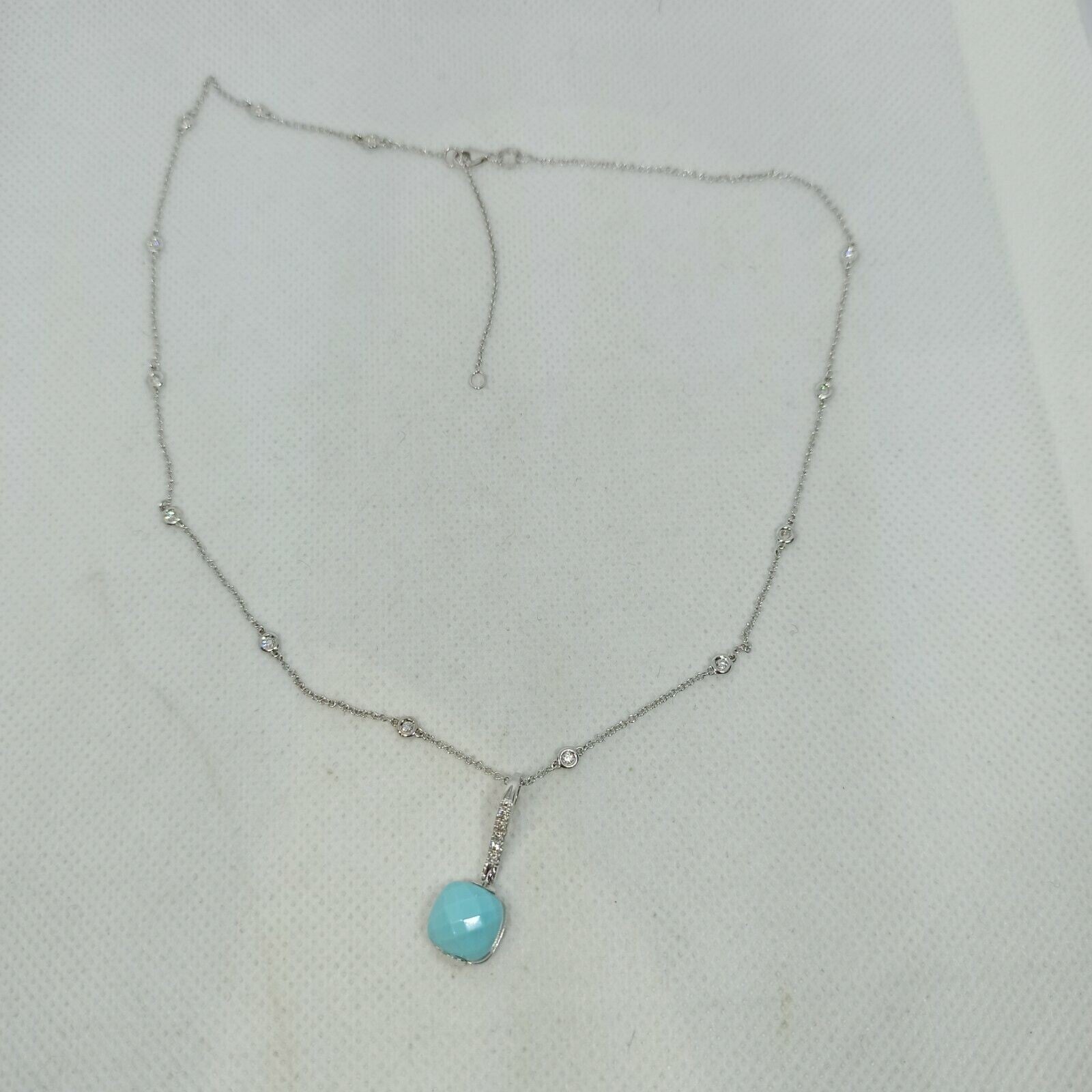 Collana punti luce oro bianco 18 kt pendente turchese diamanti marca Zoccai.