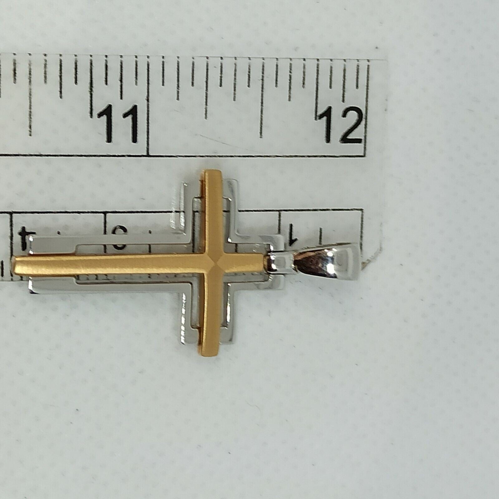 Croce da uomo in oro bianco e rosa  18 kt ( 750)  grammi 5,75.