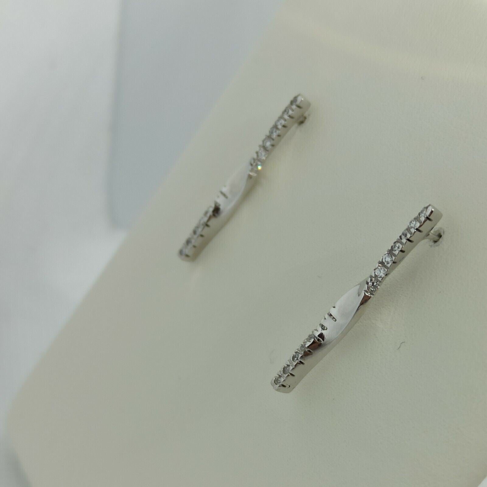 Orecchini a pendenti torchon in oro bianco lucido con zirconi