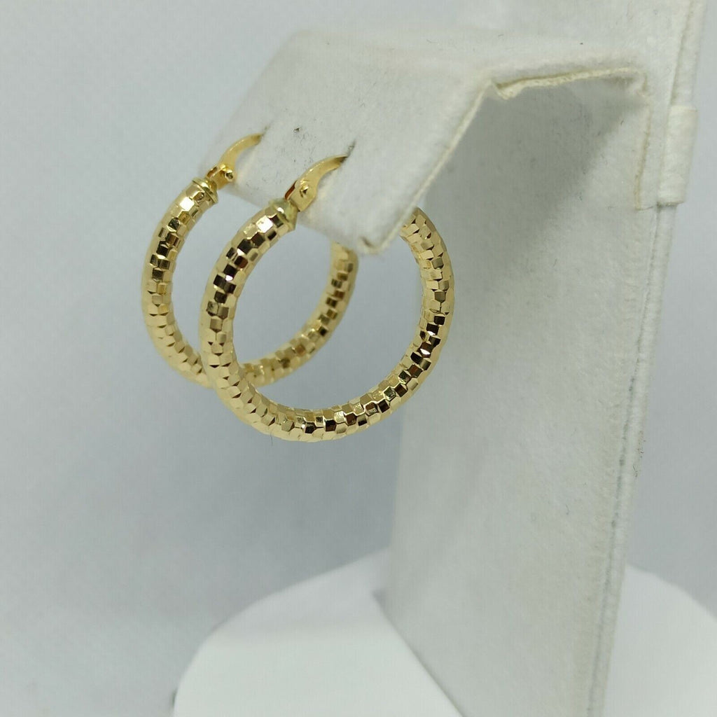 Orecchini cerchi oro giallo 18 kt  con incisioni molto luminoso diametro 21 mm