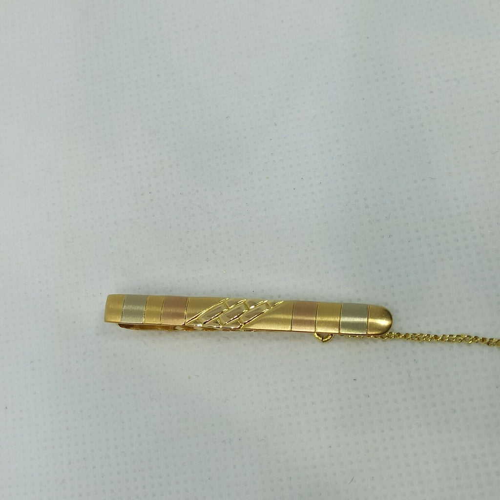 Fermacravatta in oro giallo rosa e  bianco satinato  18 kt