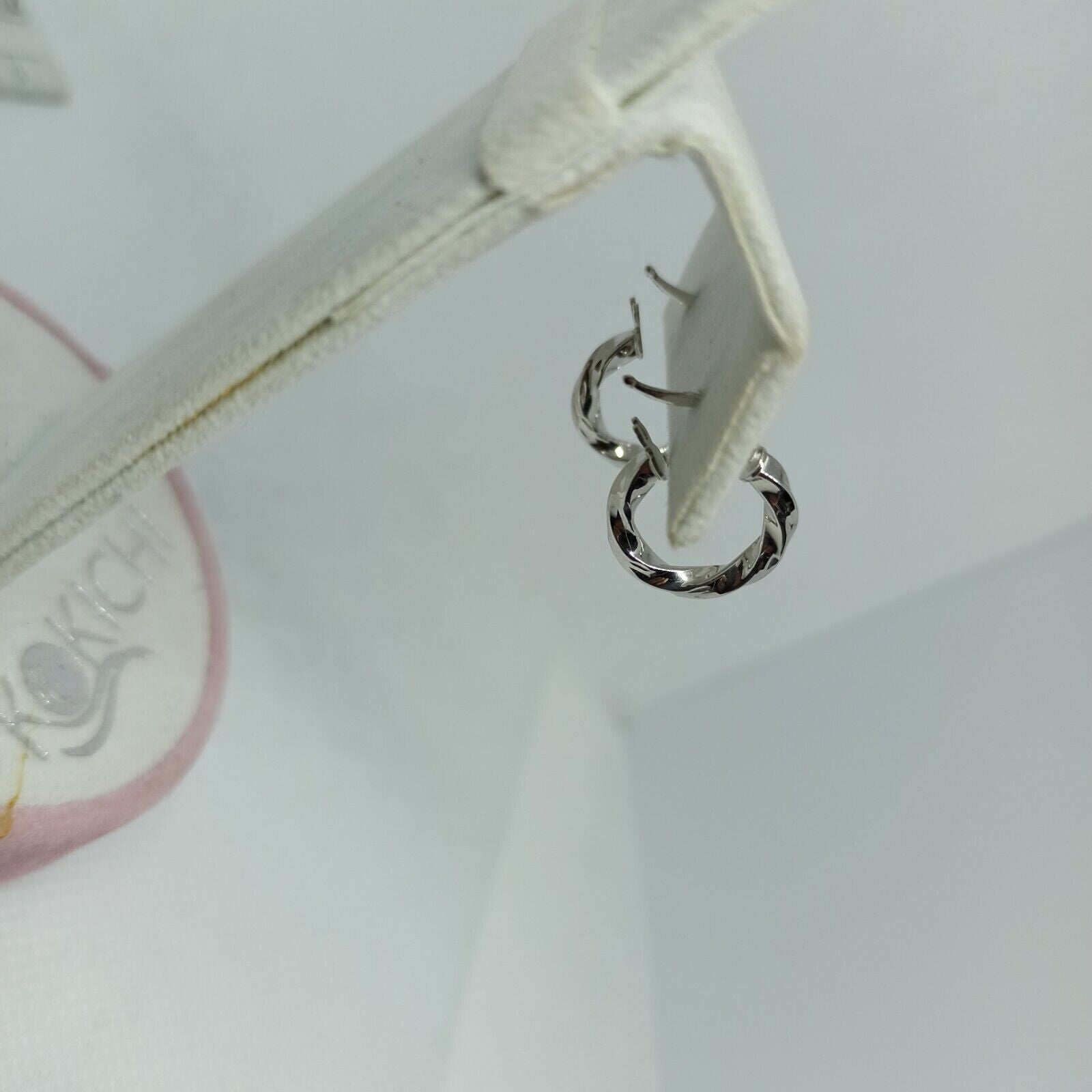 Orecchini a cerchi torchon in oro bianco lucido 18 kt diametro 15 millimetri