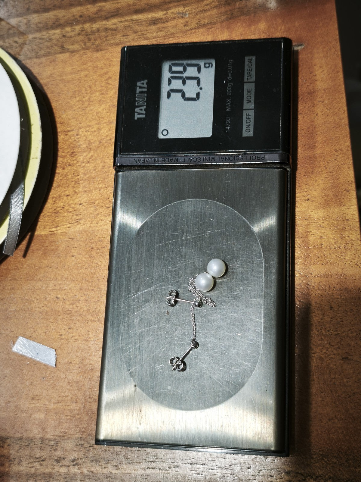 Orecchino Pendente 5,5 Cm in oro 18 kt  perla naturale d'acqua dolce 7-7/5 mm.