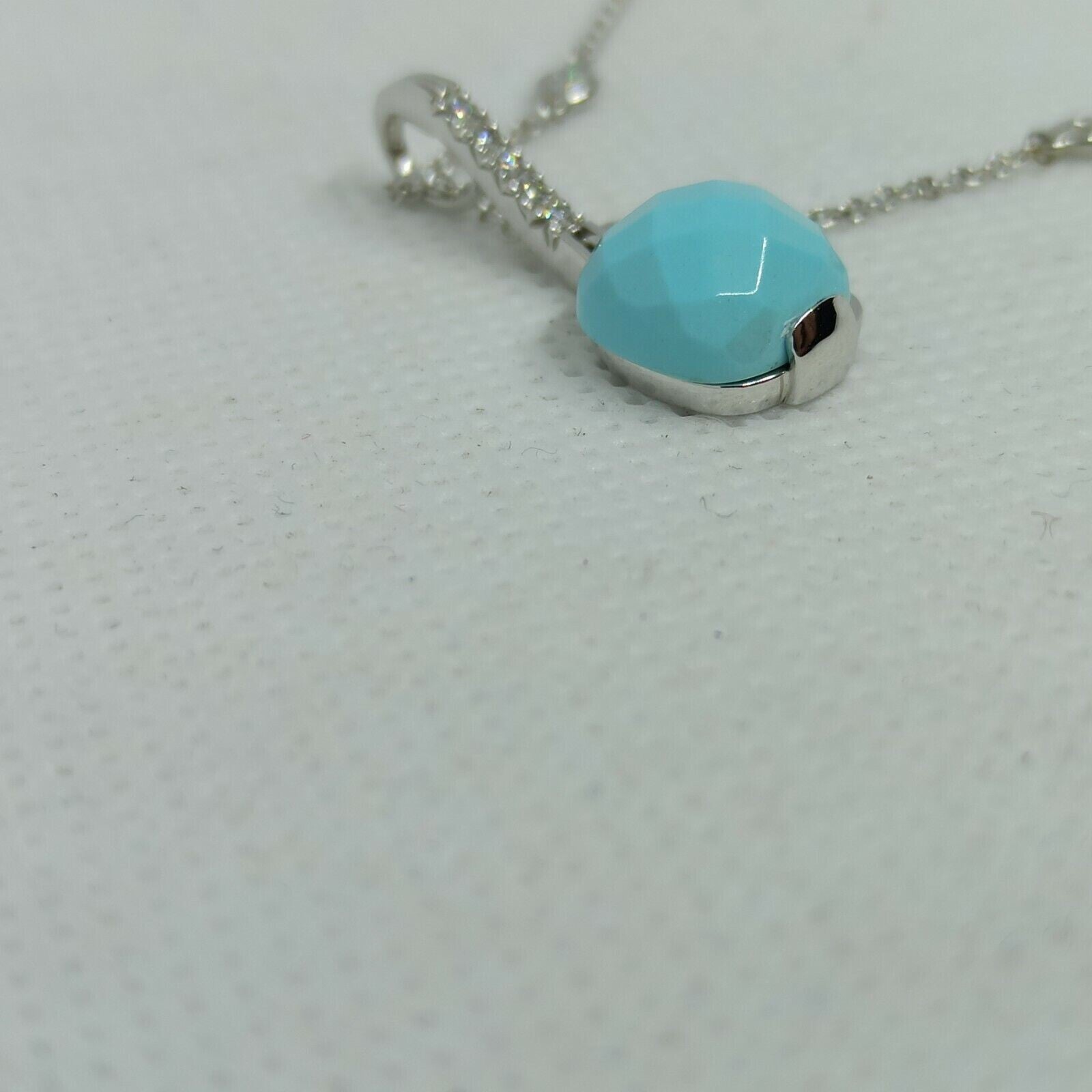 Collana punti luce oro bianco 18 kt pendente turchese diamanti marca Zoccai.