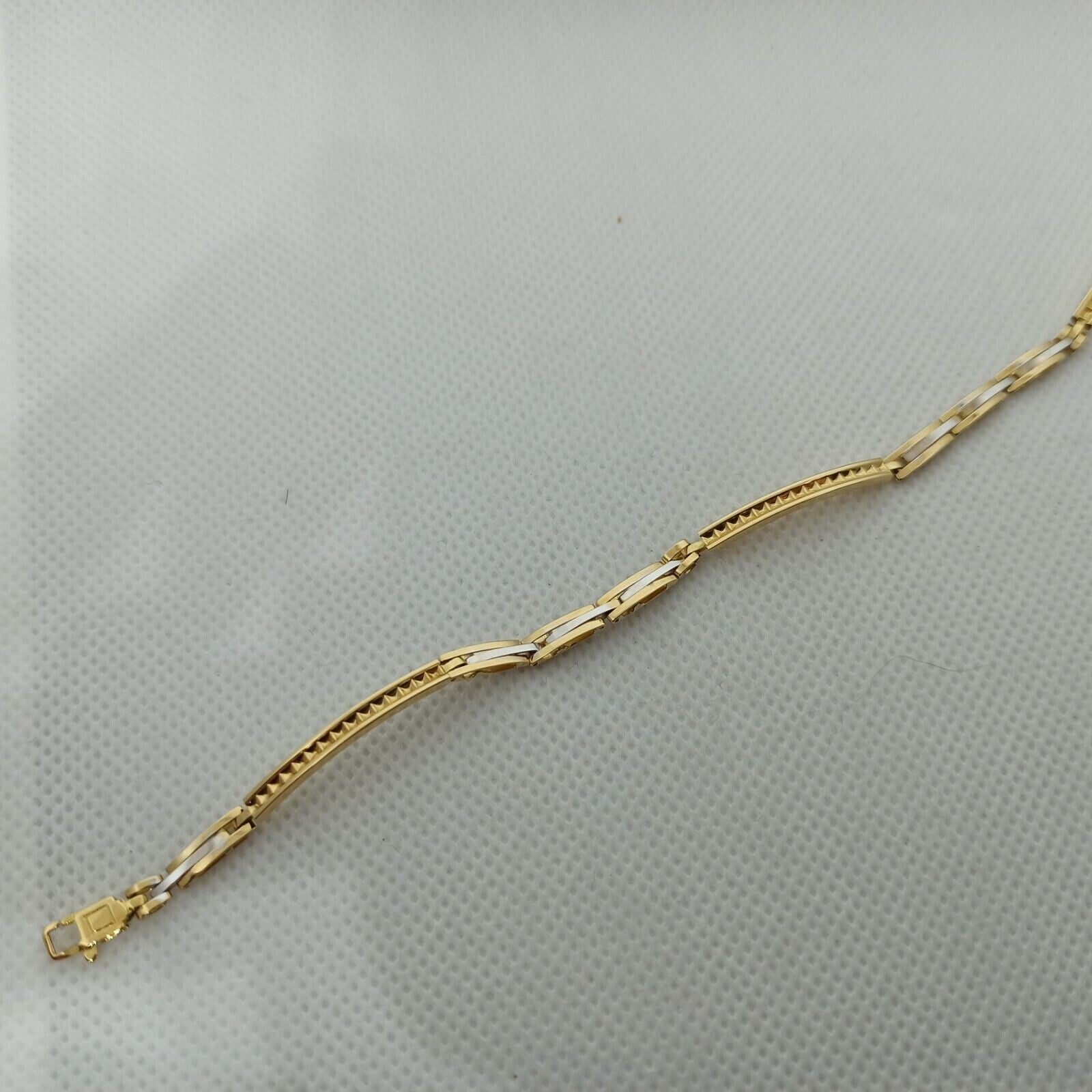 Bracciale a maglie da uomo in oro giallo e bianco 18 kt ( 750)  grammi 5,4. 