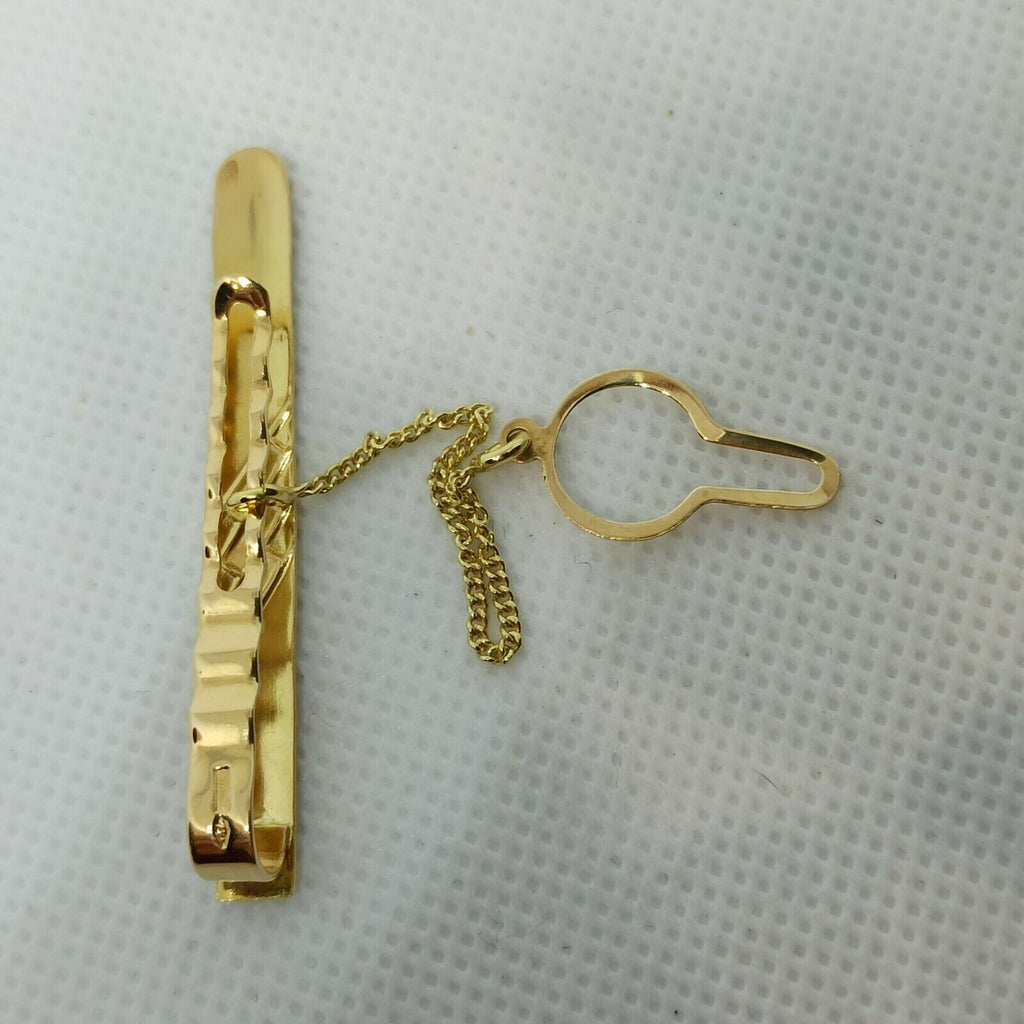 Fermacravatta in oro giallo rosa e  bianco satinato  18 kt