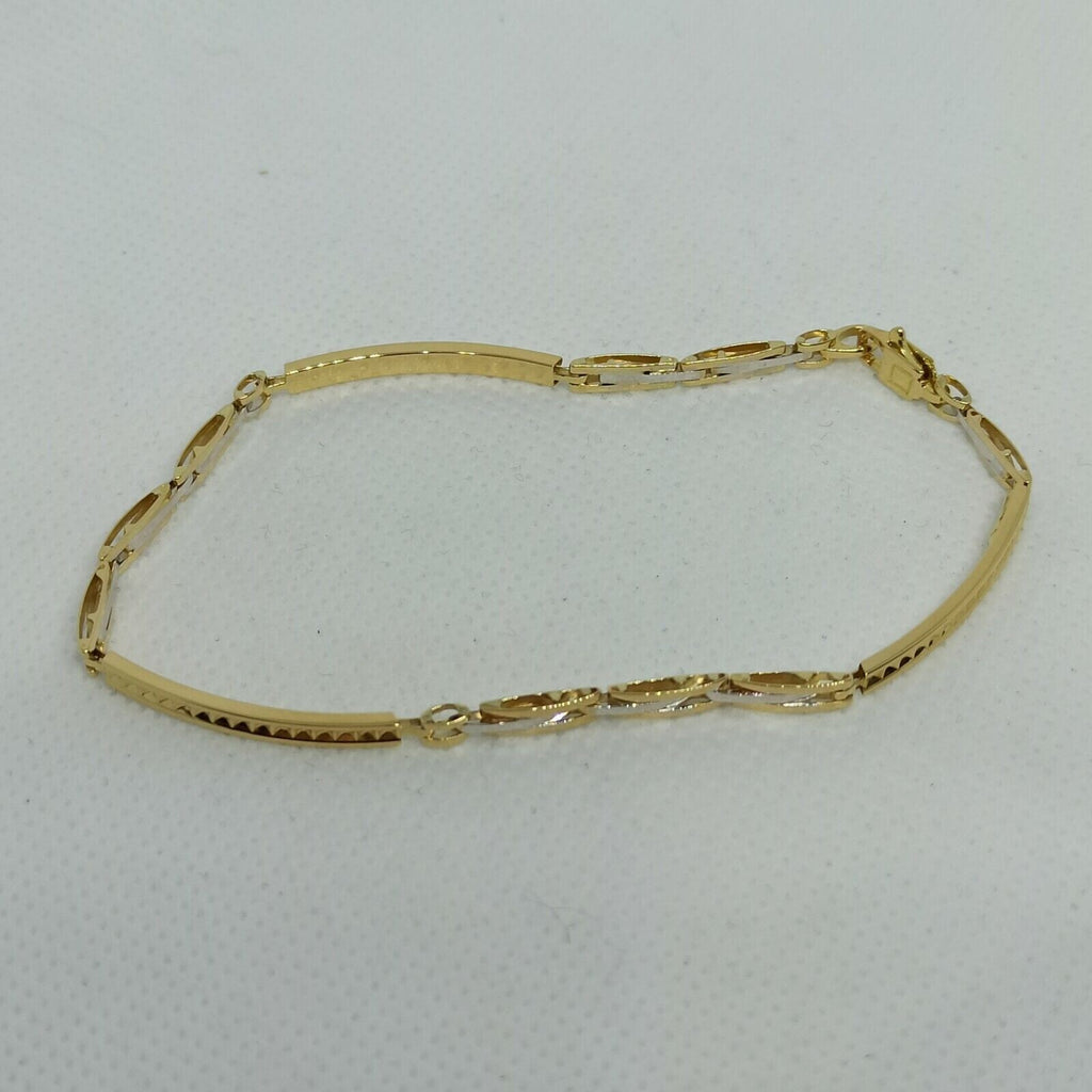 Bracciale a maglie da uomo in oro giallo e bianco 18 kt ( 750)  grammi 5,4. 