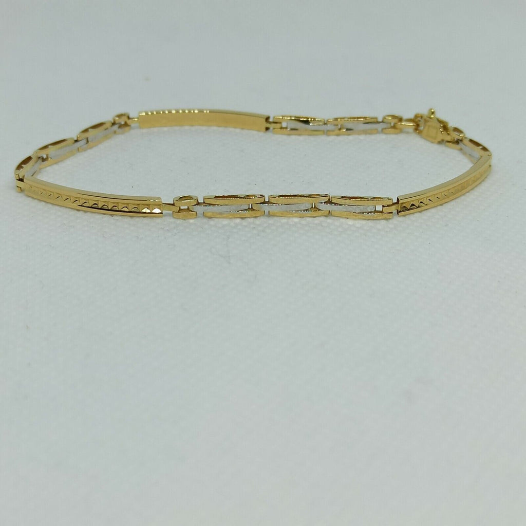Bracciale a maglie da uomo in oro giallo e bianco 18 kt ( 750)  grammi 5,4. 