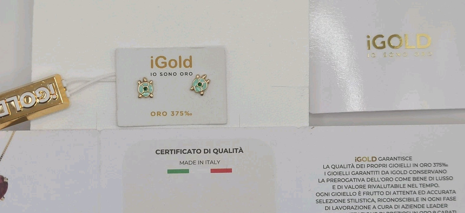 Orecchini in oro giallo 9 kt modello tartaruga con smalti. 