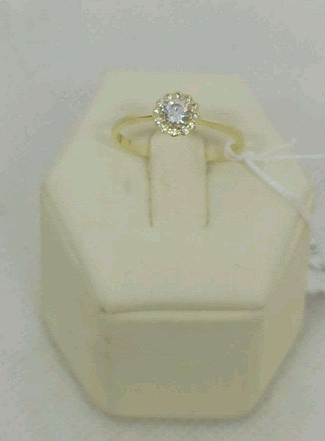 Anello solitario  in oro giallo 9  kt con zirconi.