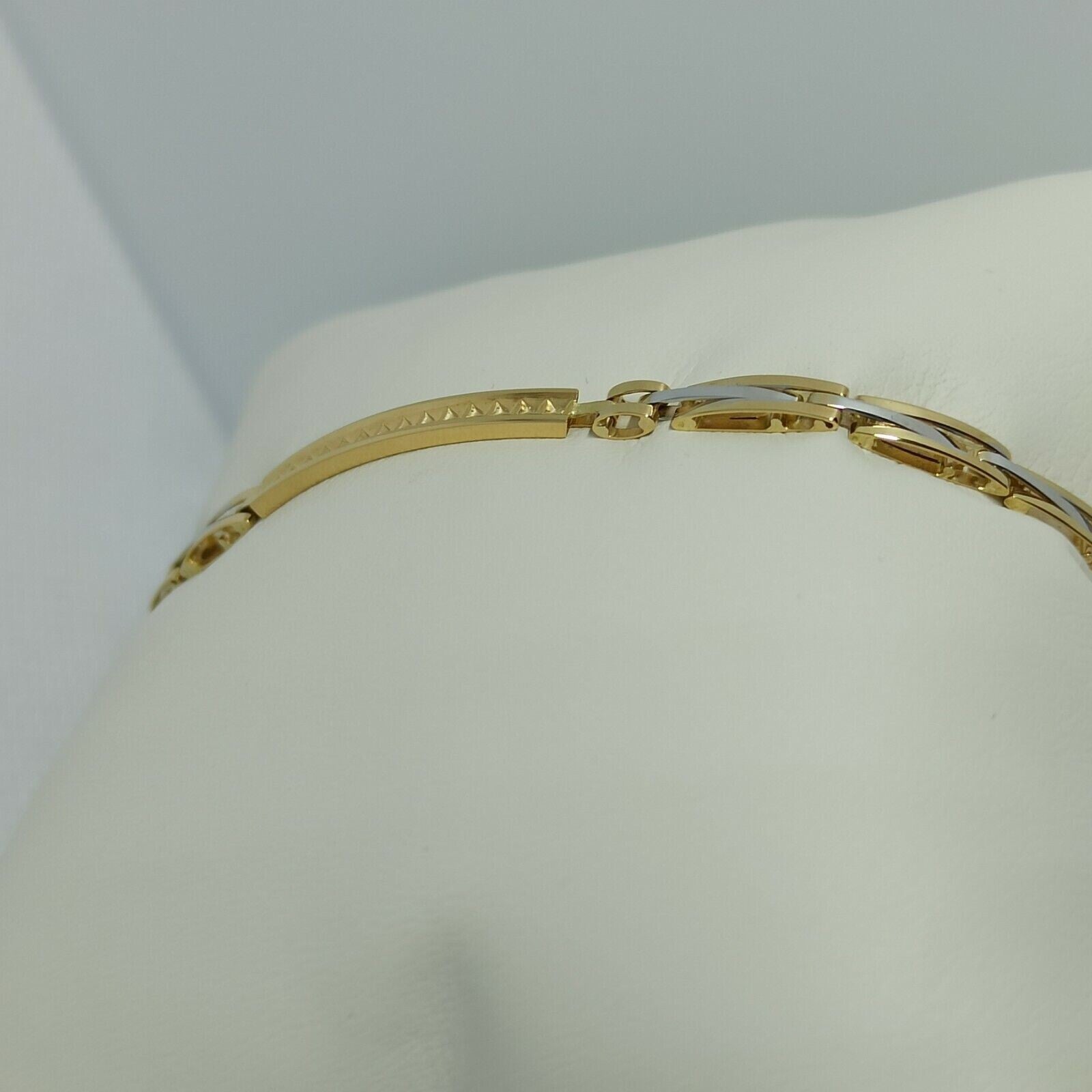 Bracciale a maglie da uomo in oro giallo e bianco 18 kt ( 750)  grammi 5,4. 