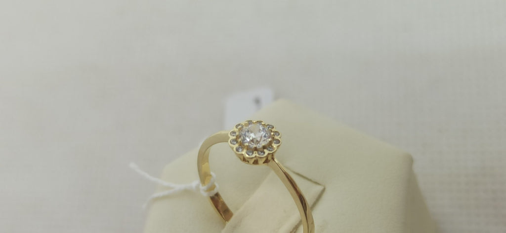Anello solitario  in oro giallo 9  kt con zirconi.