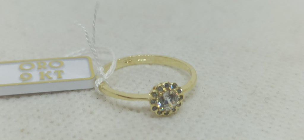 Anello solitario  in oro giallo 9  kt con zirconi.