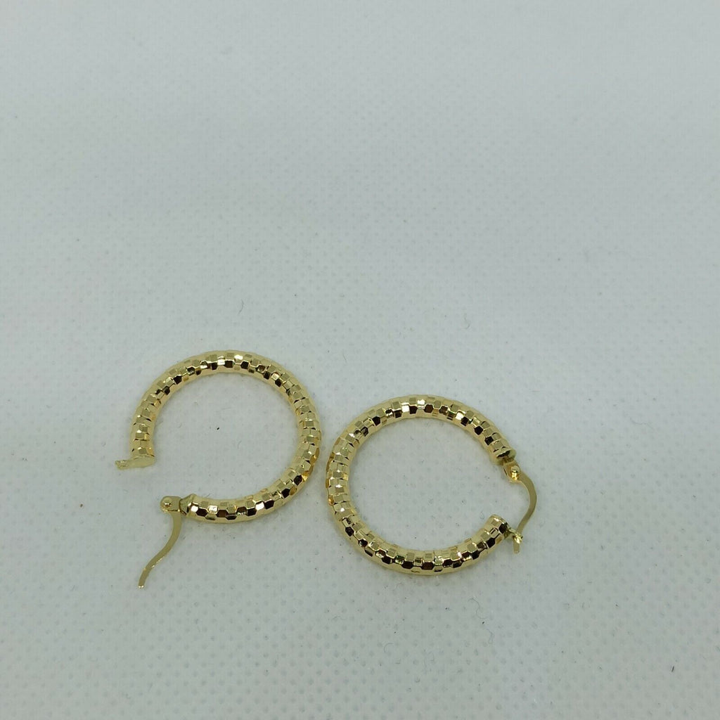 Orecchini cerchi oro giallo 18 kt  con incisioni molto luminoso diametro 21 mm