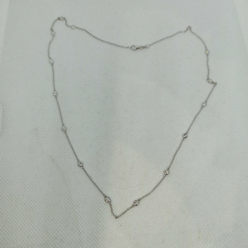 Collana punti luce oro bianco 18 kt pendente turchese diamanti marca Zoccai.