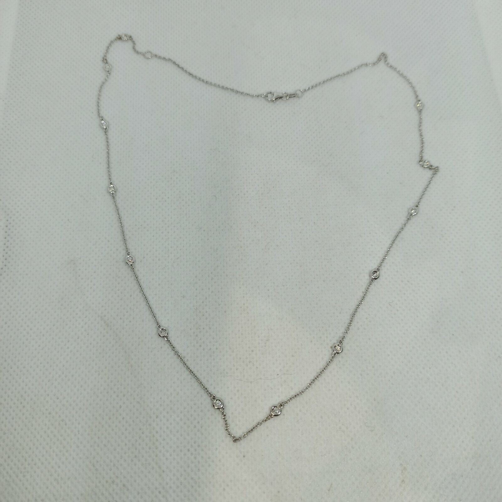 Collana punti luce oro bianco 18 kt pendente turchese diamanti marca Zoccai.