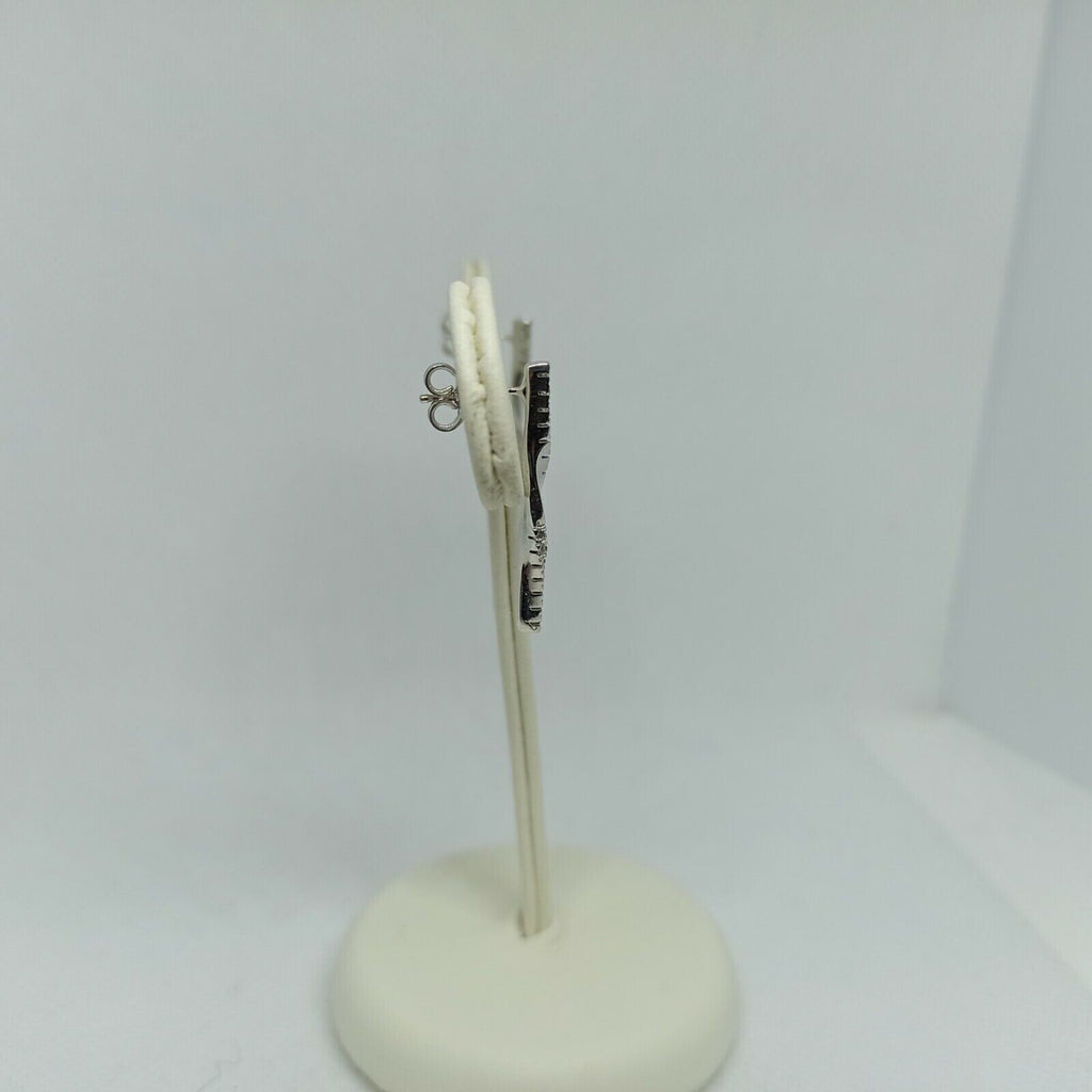 Orecchini a pendenti torchon in oro bianco lucido con zirconi