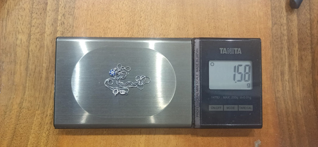 Collana Punto Luce Oro Bianco 18 Kt Con Pietre Bianche E Blu