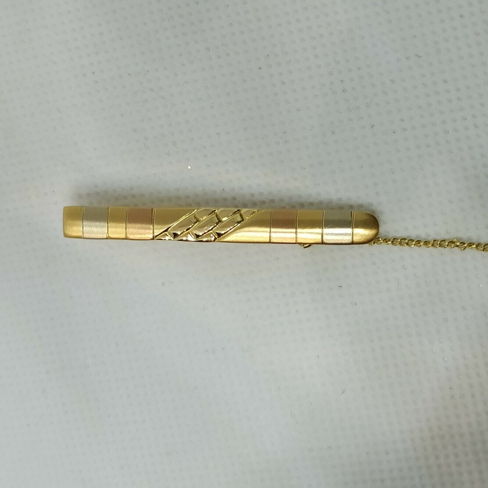 Fermacravatta in oro giallo rosa e  bianco satinato  18 kt