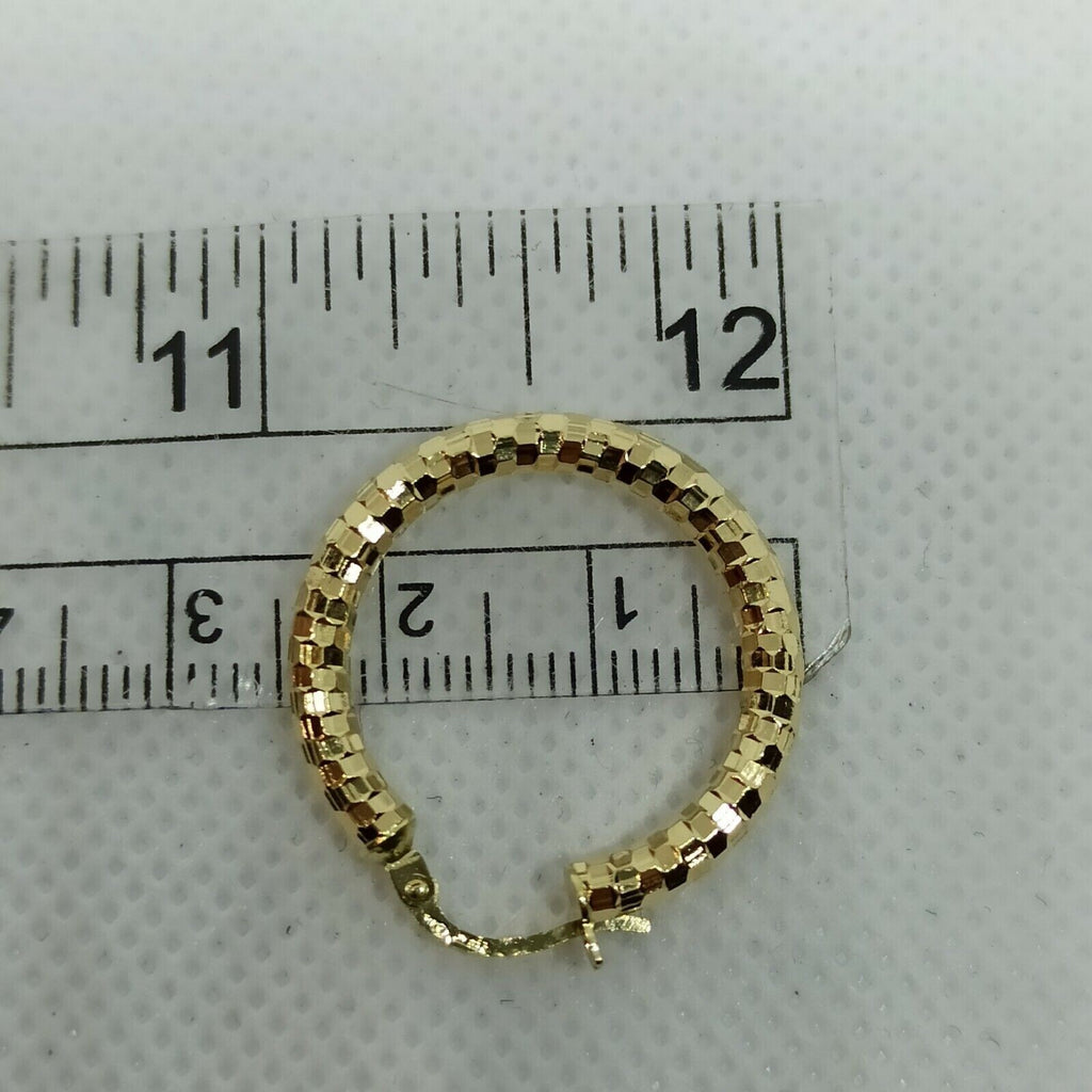 Orecchini cerchi oro giallo 18 kt  con incisioni molto luminoso diametro 21 mm